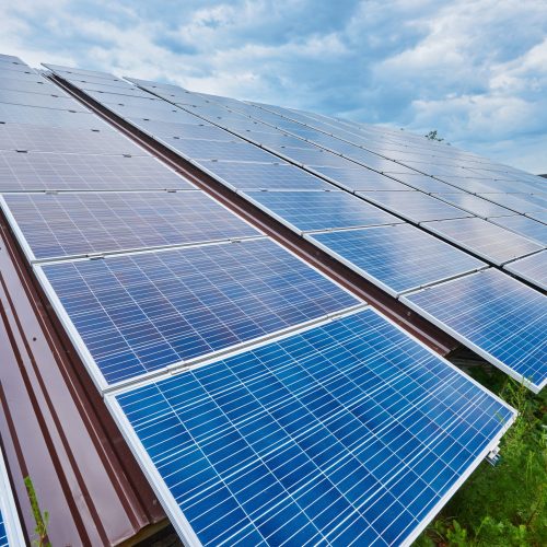 The solar panel generates green electricity Solar panel produces green, environmentally friendly energy from the sun.